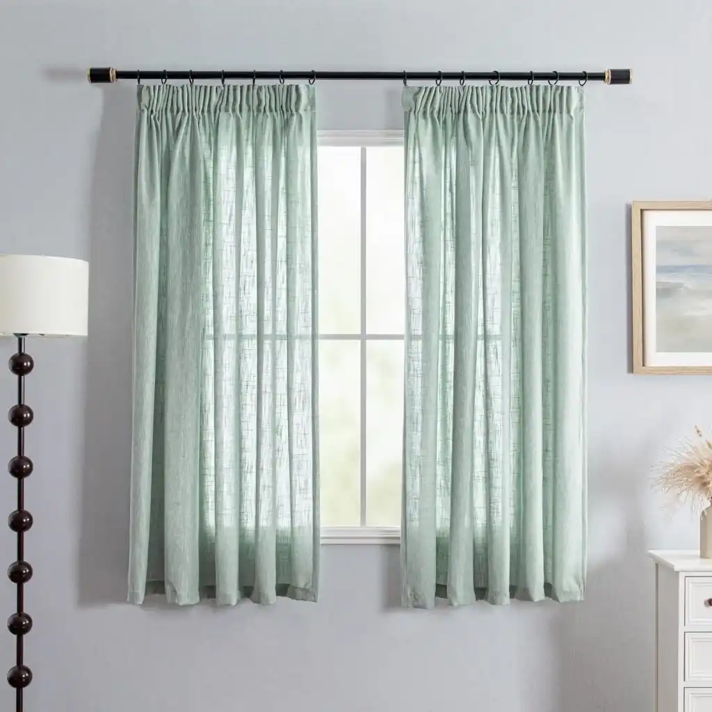 Sage green linen-textured curtains dubai